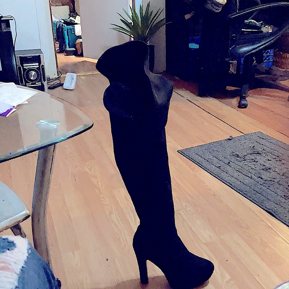 Sexy!!! only wore once thigh high black boots